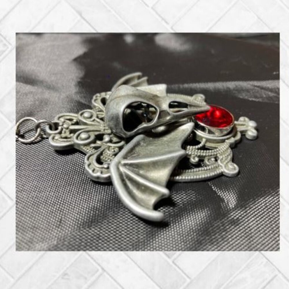 "Evil Bat" Bird Skeleton Head and Ruby-Colored Austrian Crystal Pendant - Picture 6 of 11